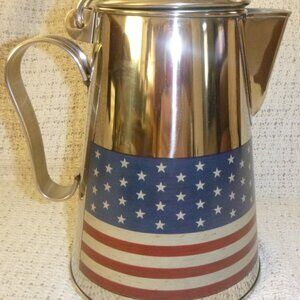 Vintage silver metal pitcher or coffee pot.